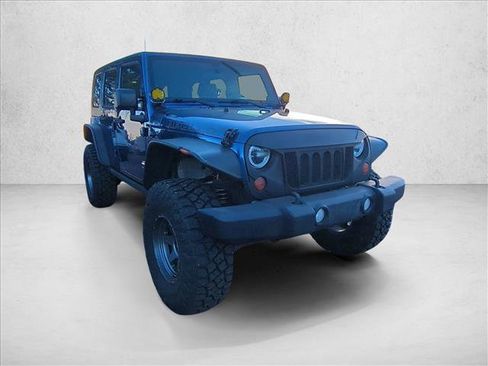 Used 2010 Jeep Wrangler Unlimited Rubicon w/ Dual Top Group image 3