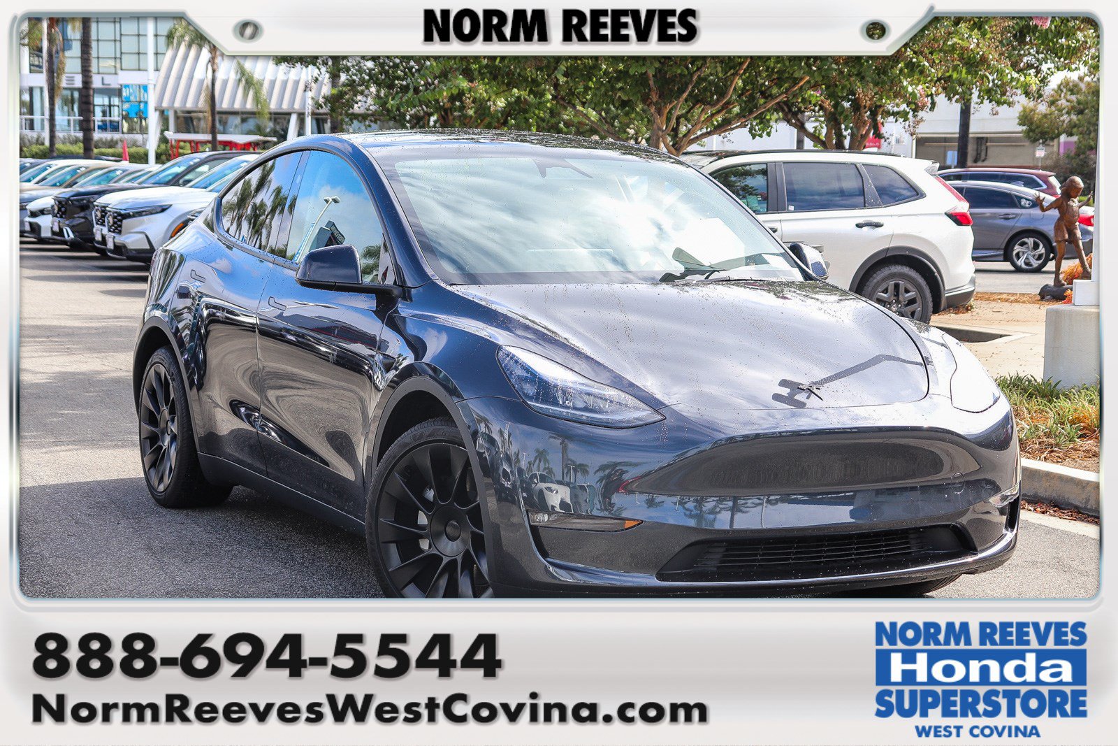 Used 2024 Tesla Model Y Long Range AWD/4WD image 1
