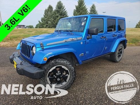 Used 2014 Jeep Wrangler Unlimited Sahara AWD/4WD image 1