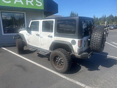 Used 2014 Jeep Wrangler Unlimited Sport w/ Dual Top Group AWD/4WD image 6