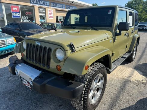 Used 2013 Jeep Wrangler Unlimited Sahara w/ Dual Top Group AWD/4WD image 2