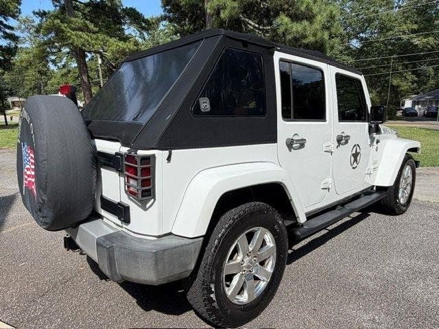 Used 2013 Jeep Wrangler Unlimited Sahara w/ Dual Top Group AWD/4WD image 25