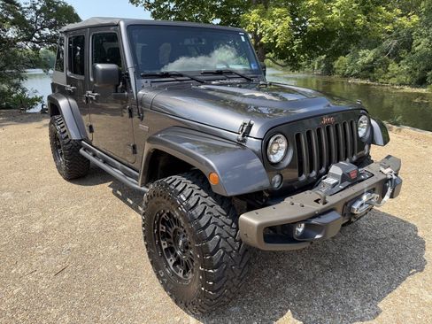 Used 2016 Jeep Wrangler Unlimited Sahara AWD/4WD image 1