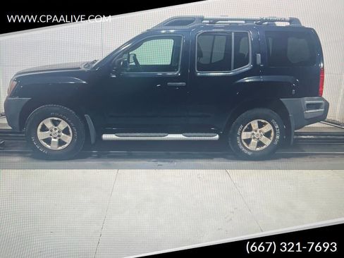 Used 2010 Nissan Xterra S image 1