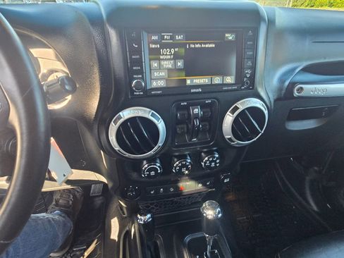 Used 2014 Jeep Wrangler Unlimited Sahara w/ Dual Top Group AWD/4WD image 6