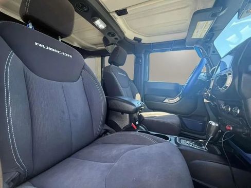 Used 2015 Jeep Wrangler Unlimited Rubicon w/ Dual Top Group AWD/4WD image 12