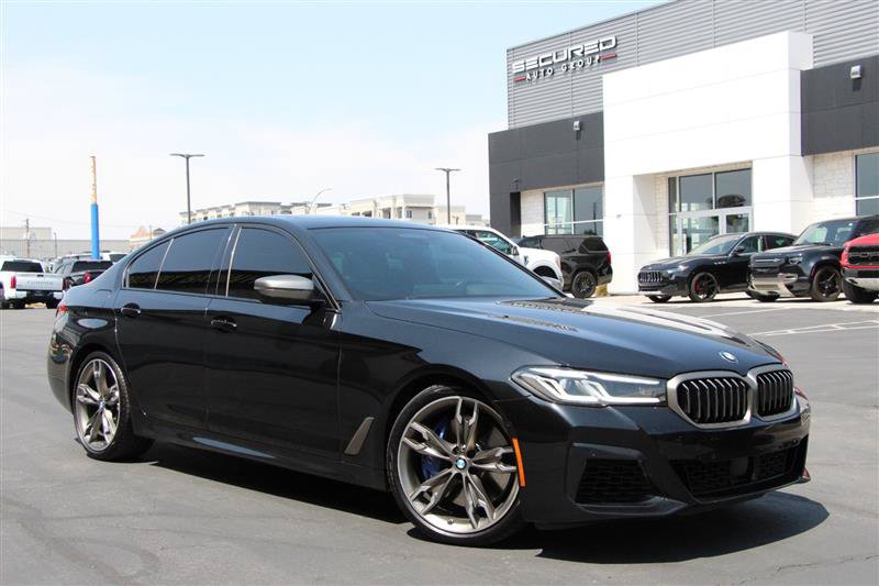 Used 2023 BMW M550i xDrive AWD/4WD image 1