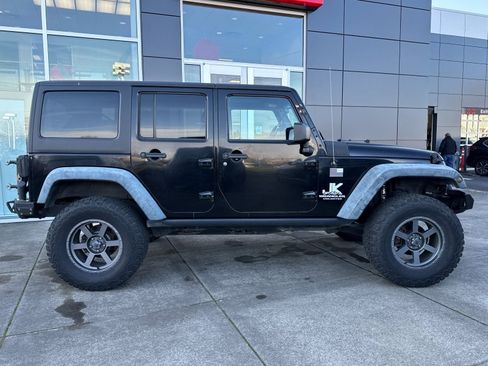 Used 2012 Jeep Wrangler Unlimited Rubicon w/ Dual Top Group image 2