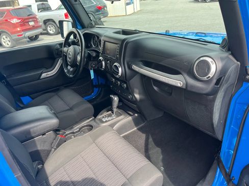 Used 2012 Jeep Wrangler Unlimited Sahara w/ Dual Top Group AWD/4WD image 11