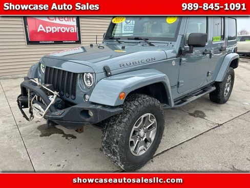 Used 2014 Jeep Wrangler Unlimited Rubicon w/ Dual Top Group image 1