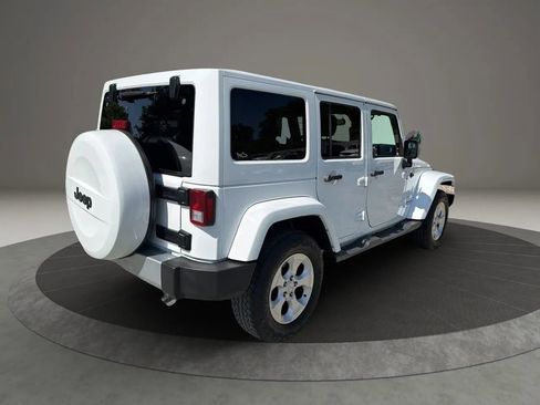 Used 2015 Jeep Wrangler Unlimited Sahara w/ Mopar Chrome Edition Group AWD/4WD image 14