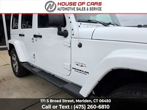 Used 2016 Jeep Wrangler Unlimited Sahara w/ Dual Top Group AWD/4WD image 12
