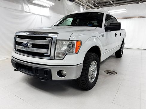 Used 2014 Ford F150 XLT AWD/4WD image 1