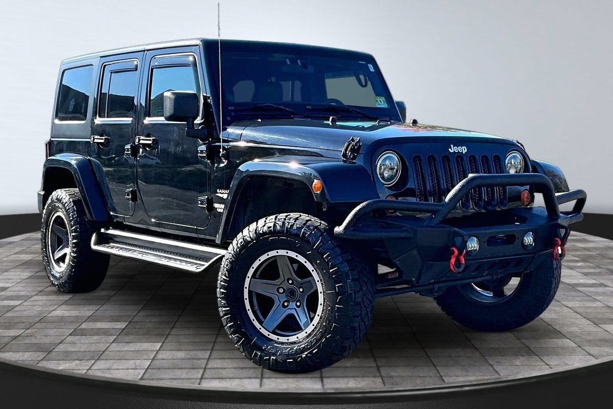 Used 2012 Jeep Wrangler Unlimited Sahara w/ Dual Top Group AWD/4WD image 3