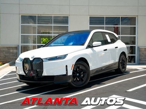 Used 2024 BMW iX xDrive50 w/ Premium Package AWD/4WD image 1