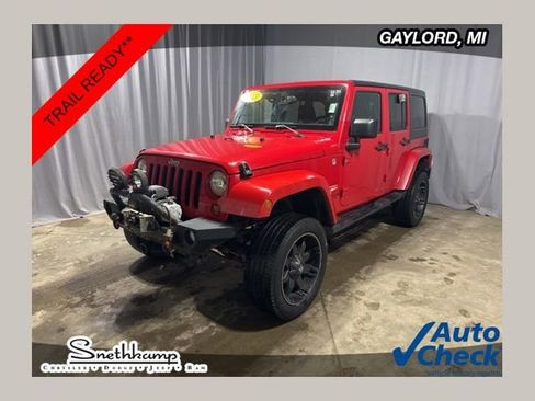 Used 2013 Jeep Wrangler Unlimited Sahara AWD/4WD image 1