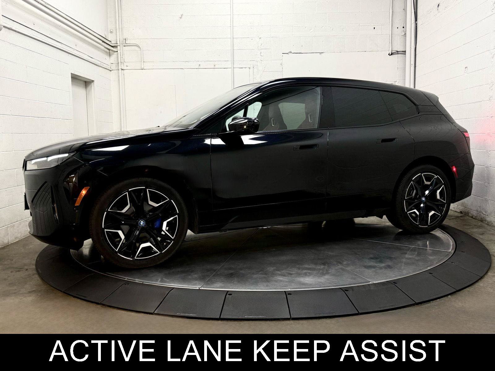 Used 2024 BMW iX xDrive50 w/ Sport Package AWD/4WD image 4