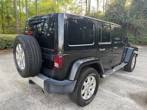 Used 2013 Jeep Wrangler Unlimited Sahara w/ Dual Top Group image 12