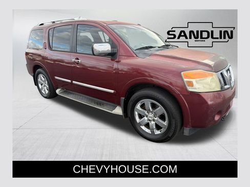 Used 2011 Nissan Armada Platinum w/ 2nd Row Captain Seat Pkg image 1
