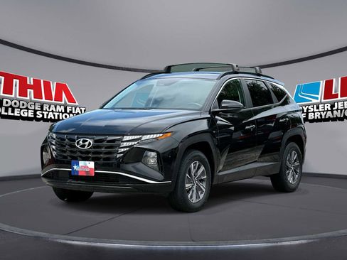 Used 2022 Hyundai Tucson Blue w/ Cargo Package AWD/4WD image 1