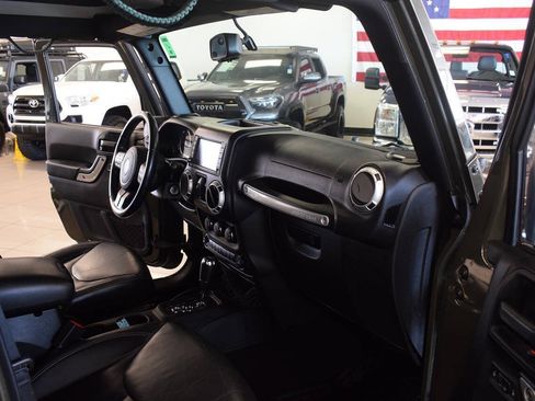 Used 2015 Jeep Wrangler Unlimited Sahara w/ Dual Top Group AWD/4WD image 42