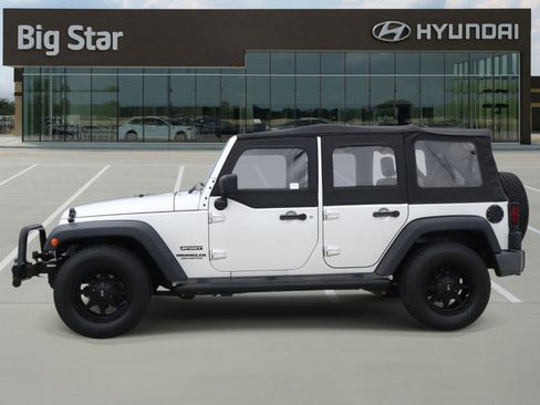 Used 2010 Jeep Wrangler Unlimited Sport w/ Black Appearance Group image 2