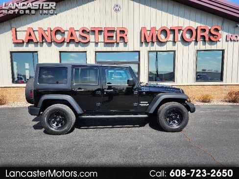 Used 2012 Jeep Wrangler Unlimited Sport AWD/4WD image 1