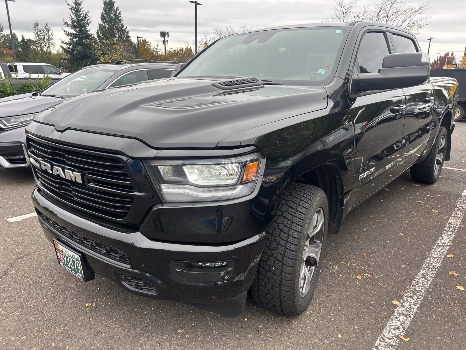 Used 2024 RAM 1500 Laramie AWD/4WD image 1