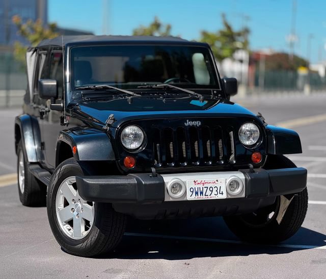 Used 2012 Jeep Wrangler Unlimited Sahara AWD/4WD image 2
