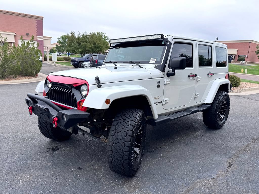 Used 2012 Jeep Wrangler Unlimited Sahara w/ Connectivity Group AWD/4WD image 4