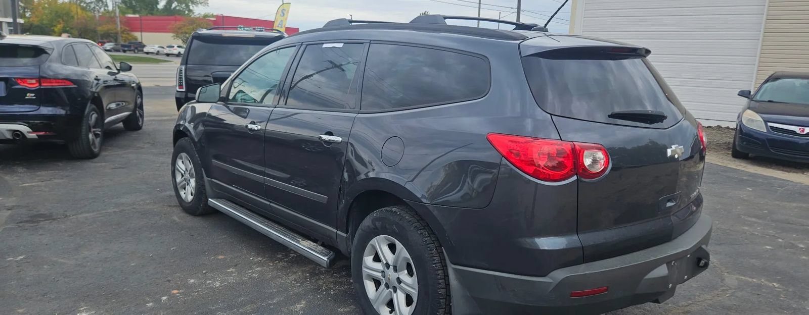 Used 2012 Chevrolet Traverse LS w/ LPO, 'HIT The Road' Package FWD image 4