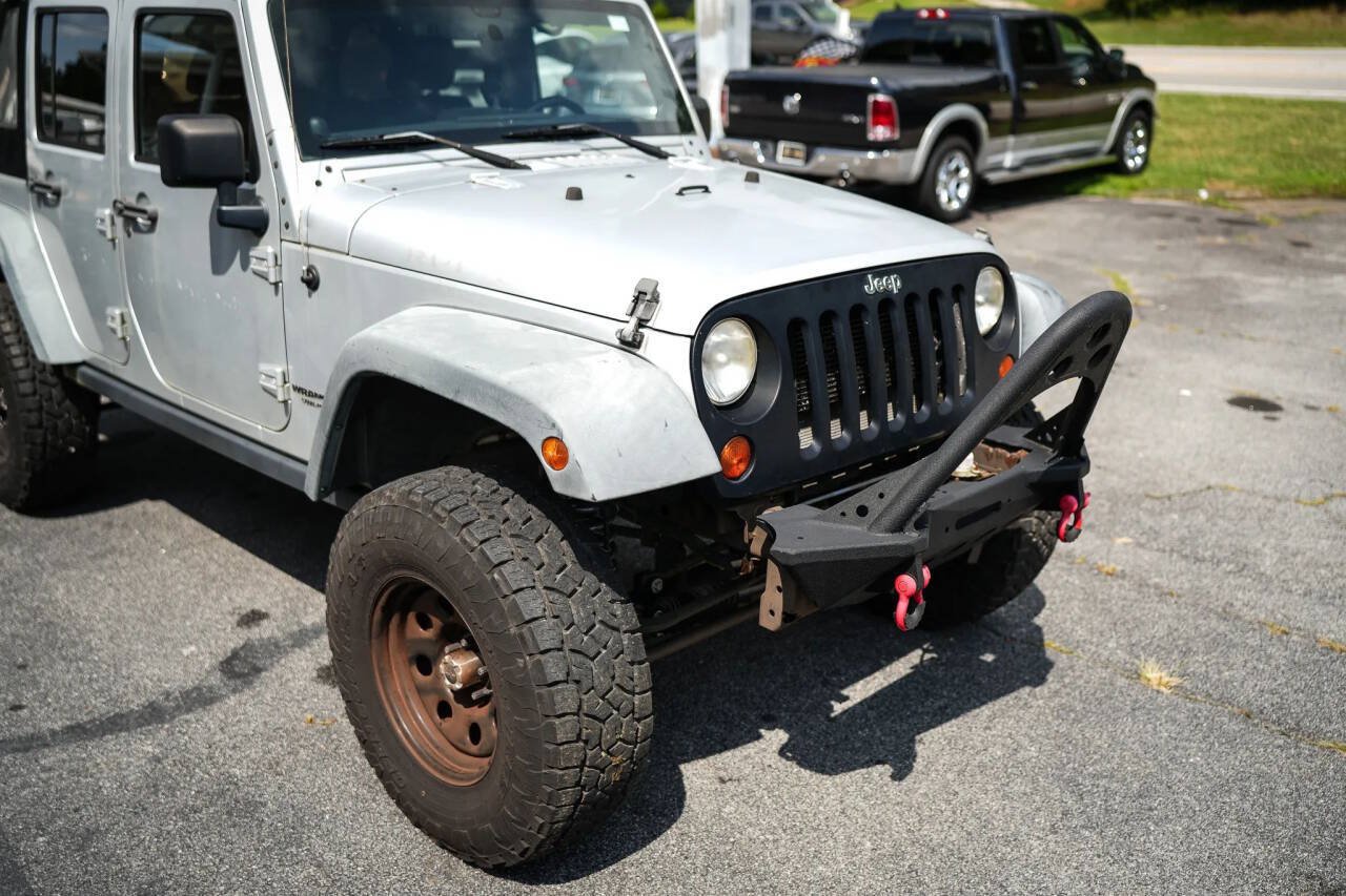 Used 2012 Jeep Wrangler Unlimited Rubicon w/ Dual Top Group AWD/4WD image 11