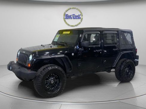 Used 2013 Jeep Wrangler Unlimited Sport AWD/4WD image 1