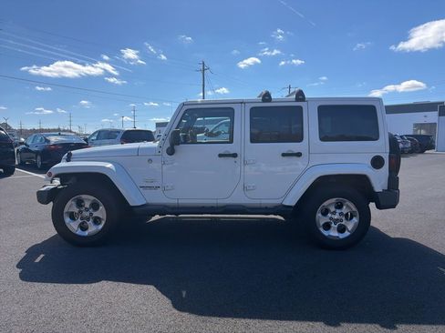 Used 2014 Jeep Wrangler Unlimited Sahara w/ Dual Top Group image 8