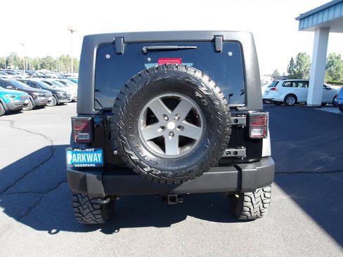 Used 2011 Jeep Wrangler Unlimited Rubicon w/ Dual Top Group AWD/4WD image 4
