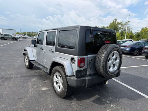 Used 2014 Jeep Wrangler Unlimited Sahara w/ Dual Top Group AWD/4WD image 5