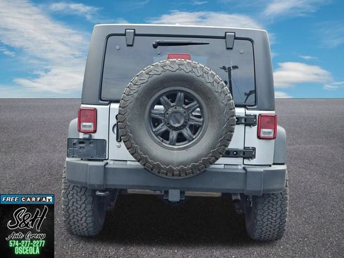Used 2013 Jeep Wrangler Unlimited Rubicon w/ Dual Top Group AWD/4WD image 14