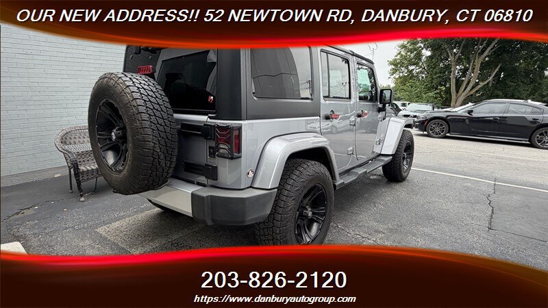 Used 2014 Jeep Wrangler Unlimited Sahara w/ Dual Top Group AWD/4WD image 5