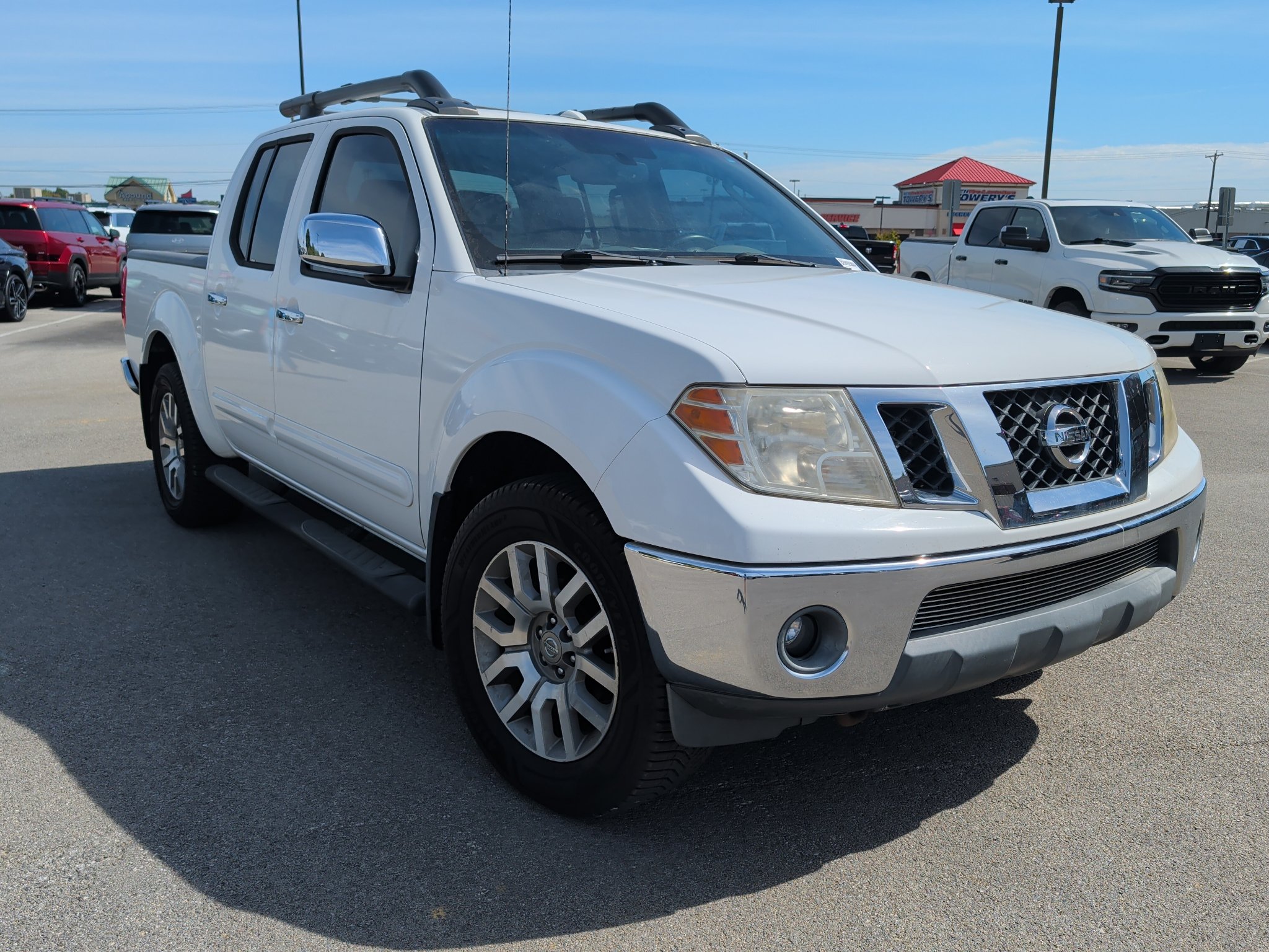 Used 2011 Nissan Frontier SL w/ Moonroof Pkg AWD/4WD image 1