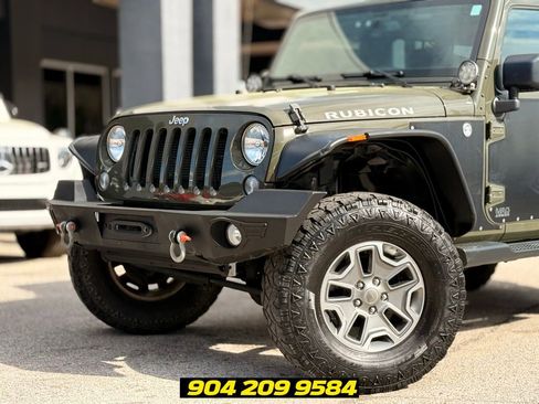 Used 2015 Jeep Wrangler Unlimited Rubicon w/ Dual Top Group AWD/4WD image 2