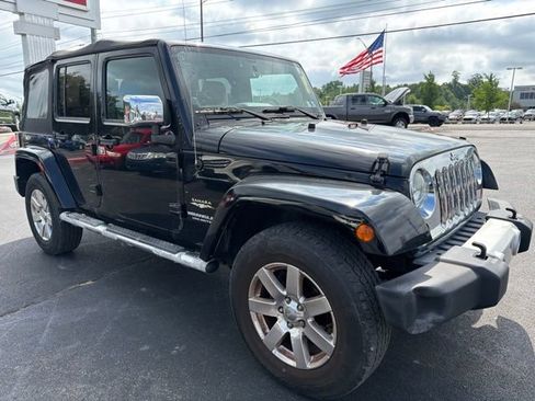 Used 2012 Jeep Wrangler Unlimited Sahara w/ Mopar Chrome Edition Group AWD/4WD image 2