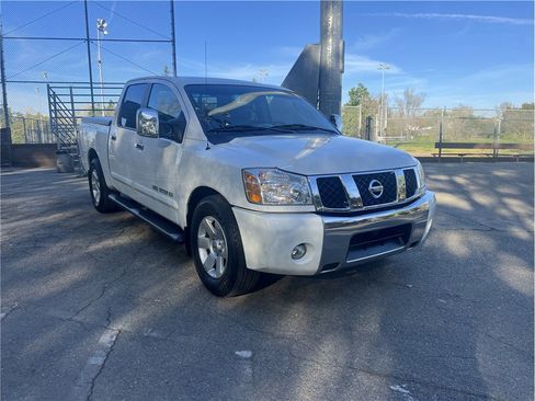 Used 2005 Nissan Titan LE w/ (U01) Nissan Navigation Pkg image 1