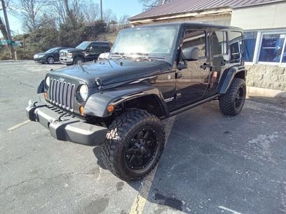 Used 2012 Jeep Wrangler Unlimited Rubicon w/ Dual Top Group