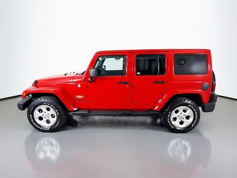 Used 2014 Jeep Wrangler Unlimited Sahara w/ Dual Top Group AWD/4WD image 4