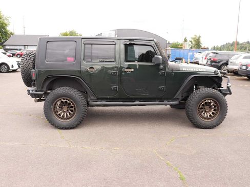 Used 2010 Jeep Wrangler Unlimited Rubicon w/ Dual Top Group AWD/4WD image 4