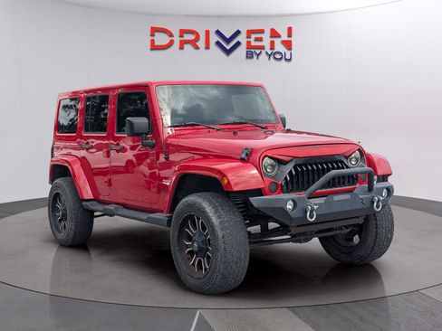 Used 2014 Jeep Wrangler Unlimited Sahara w/ Dual Top Group AWD/4WD image 7