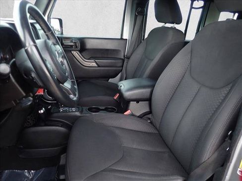Used 2013 Jeep Wrangler Unlimited Sport w/ Mopar Black Appearance Group AWD/4WD image 11