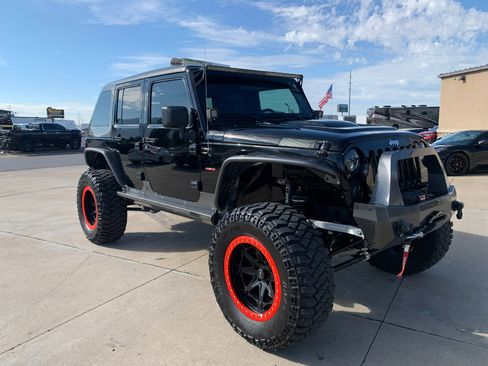 Used 2010 Jeep Wrangler Unlimited Rubicon w/ Dual Top Group image 12