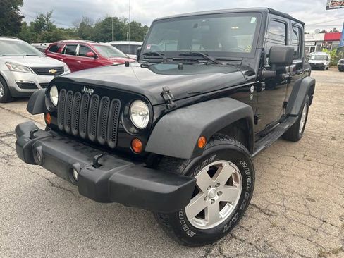 Used 2012 Jeep Wrangler Unlimited Sport image 1