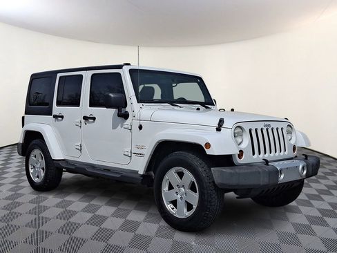 Used 2012 Jeep Wrangler Unlimited Sahara w/ Dual Top Group image 1